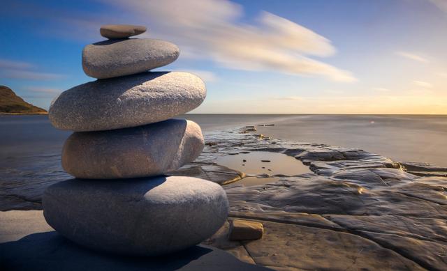 A zen-like formation of stones at a coast.